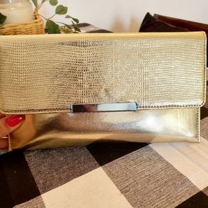 Estee Lauder gold clutch